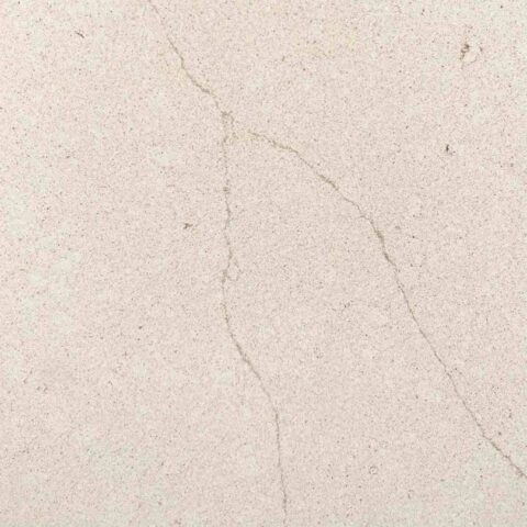 White Teti Cosmolite with a grain finish from the Stone Italiana collection – White Teti boasts no quartz and a low silica content, creamy white ground with delicate brown veining. Our only option that is not in a polished finish.